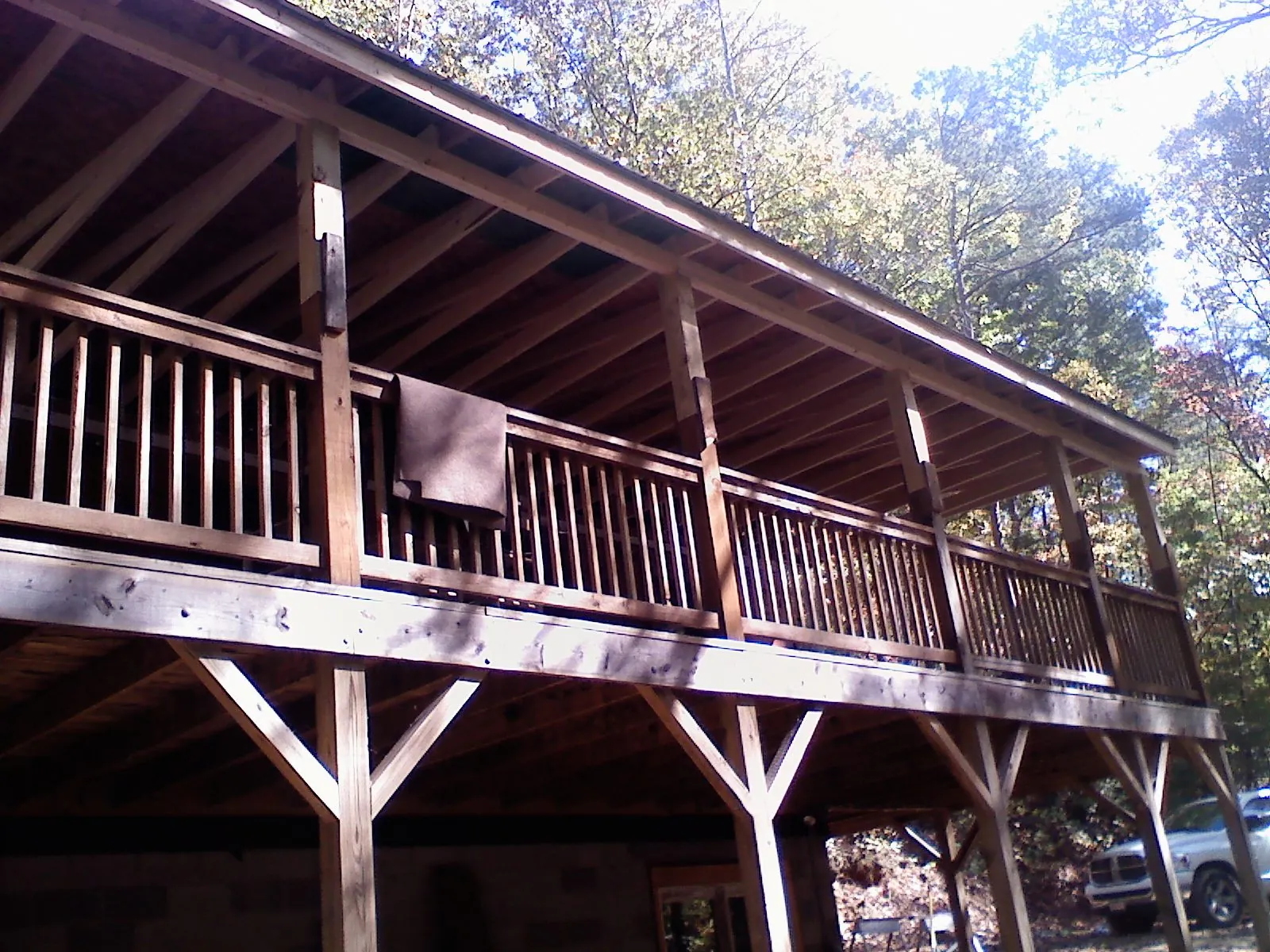 Timber framing under a new elevated porch and deck — Roof Leak Repair in New Braunfels by Roofing Brothers